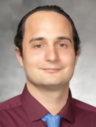 Dr Alex Frantzis